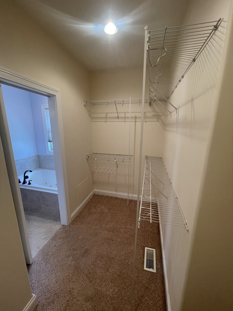 440 Edgebrook Drive Bourbonnais, IL 60914 - Photo 22 of 34 a view of a room with racks on the wall