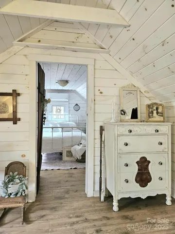 a view of a dining room with furniture and chandelier fan