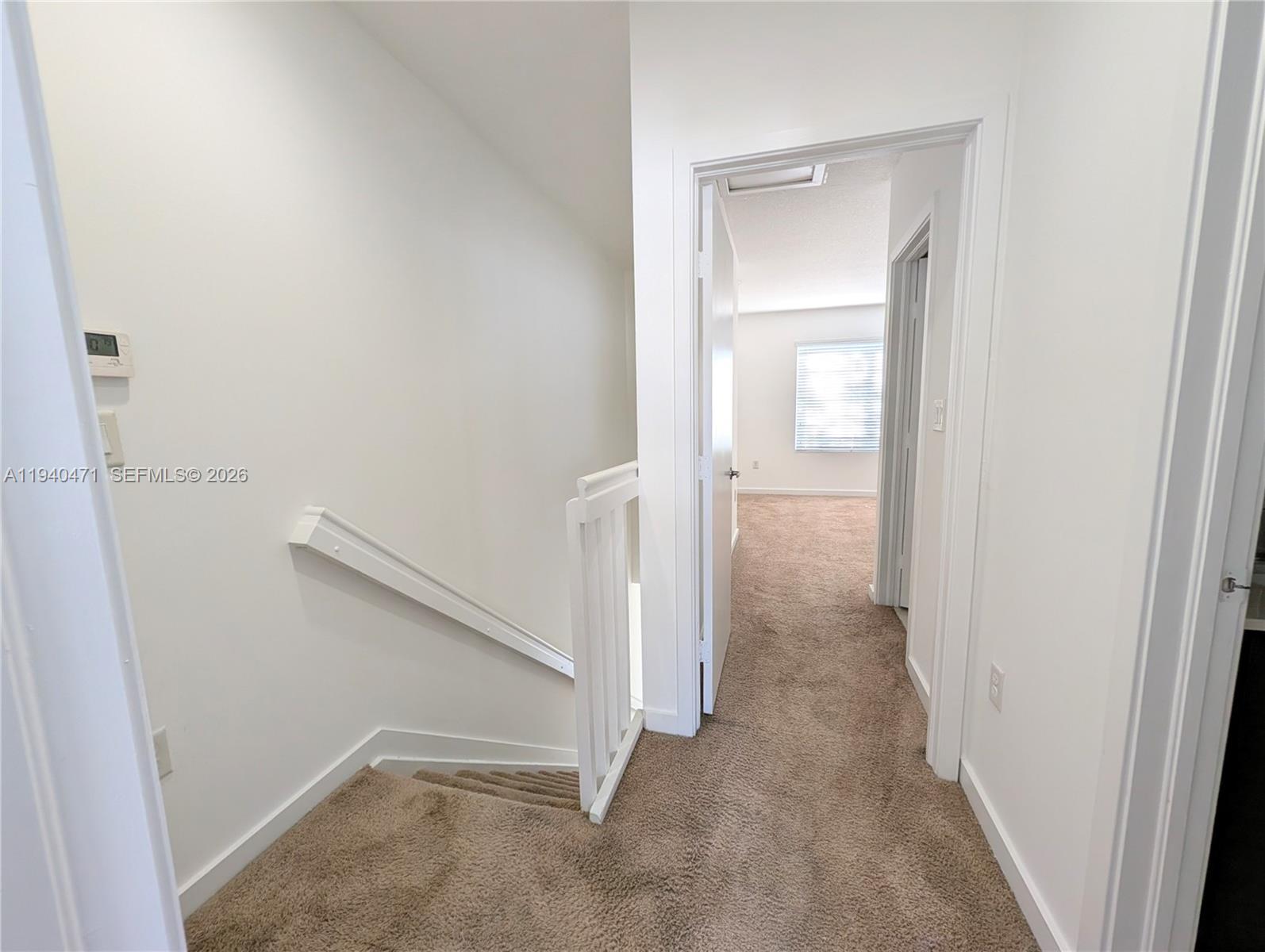 3484 Northwest 13th Street, Unit 3484 Lauderhill, FL 33311 - Photo 15 of 49 a view of a hallway with closet