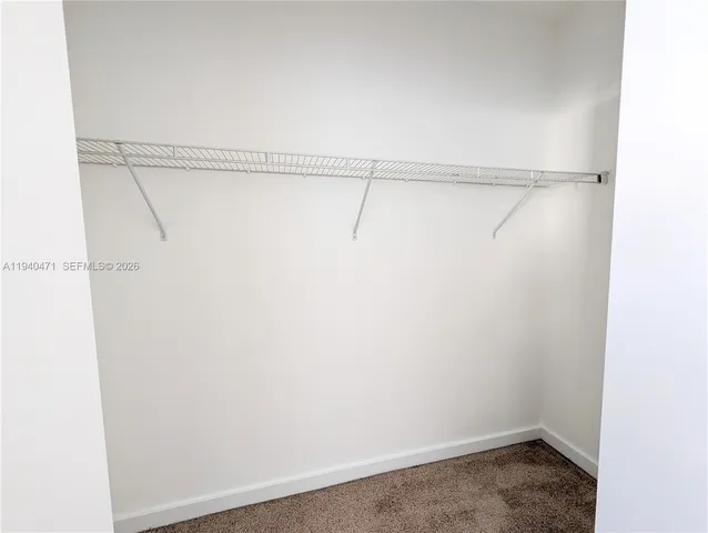 a view of small space with racks on the wall