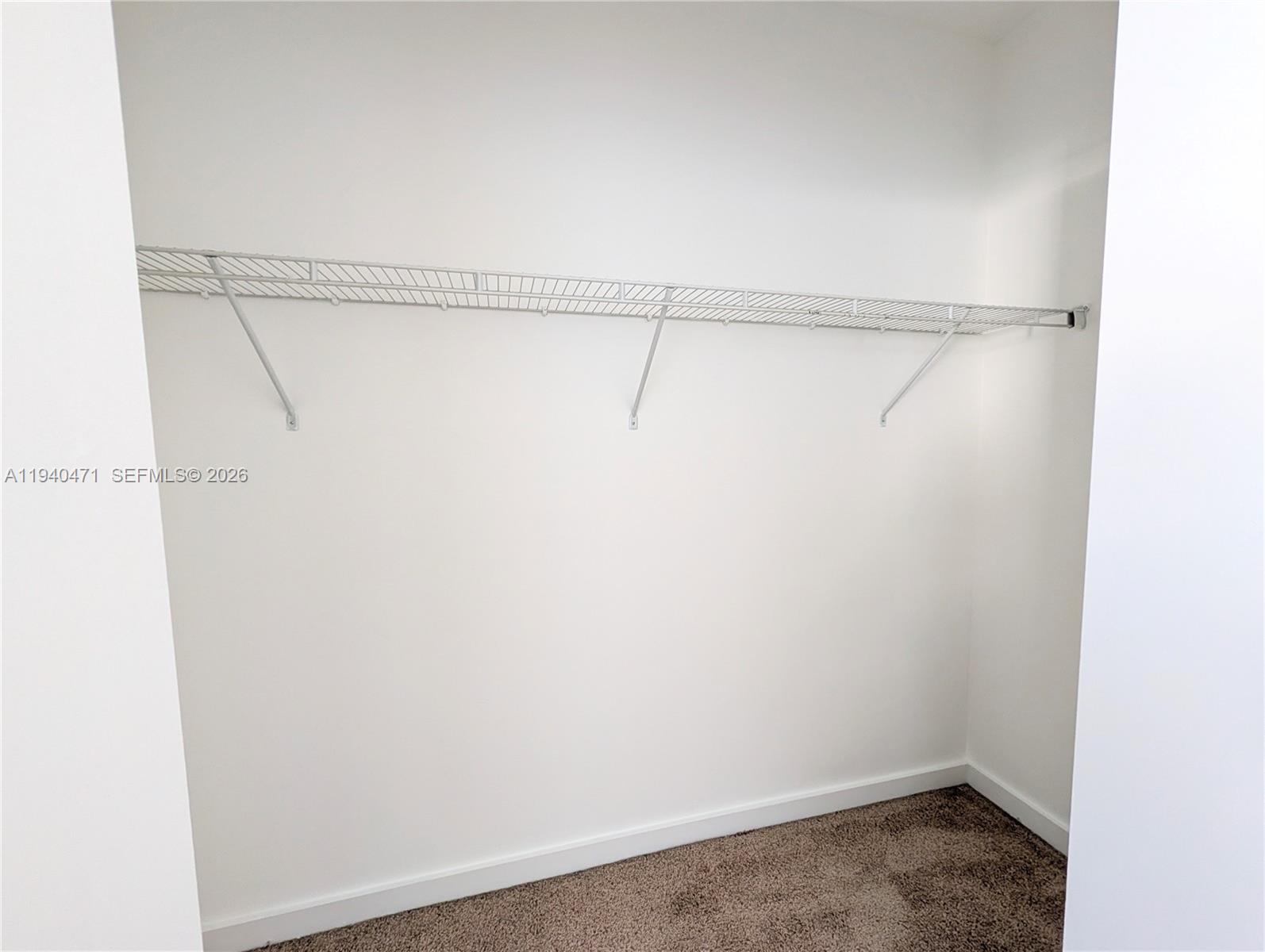 3484 Northwest 13th Street, Unit 3484 Lauderhill, FL 33311 - Photo 19 of 49 a view of small space with racks on the wall