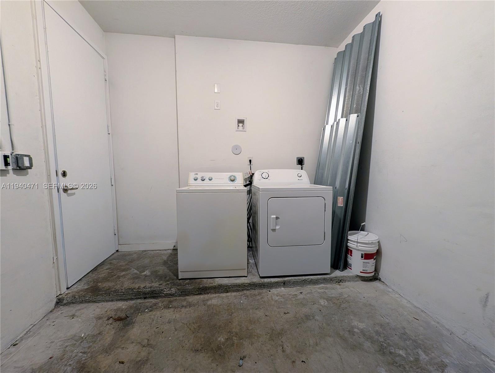3484 Northwest 13th Street, Unit 3484 Lauderhill, FL 33311 - Photo 37 of 49 a utility room with dryer and washer