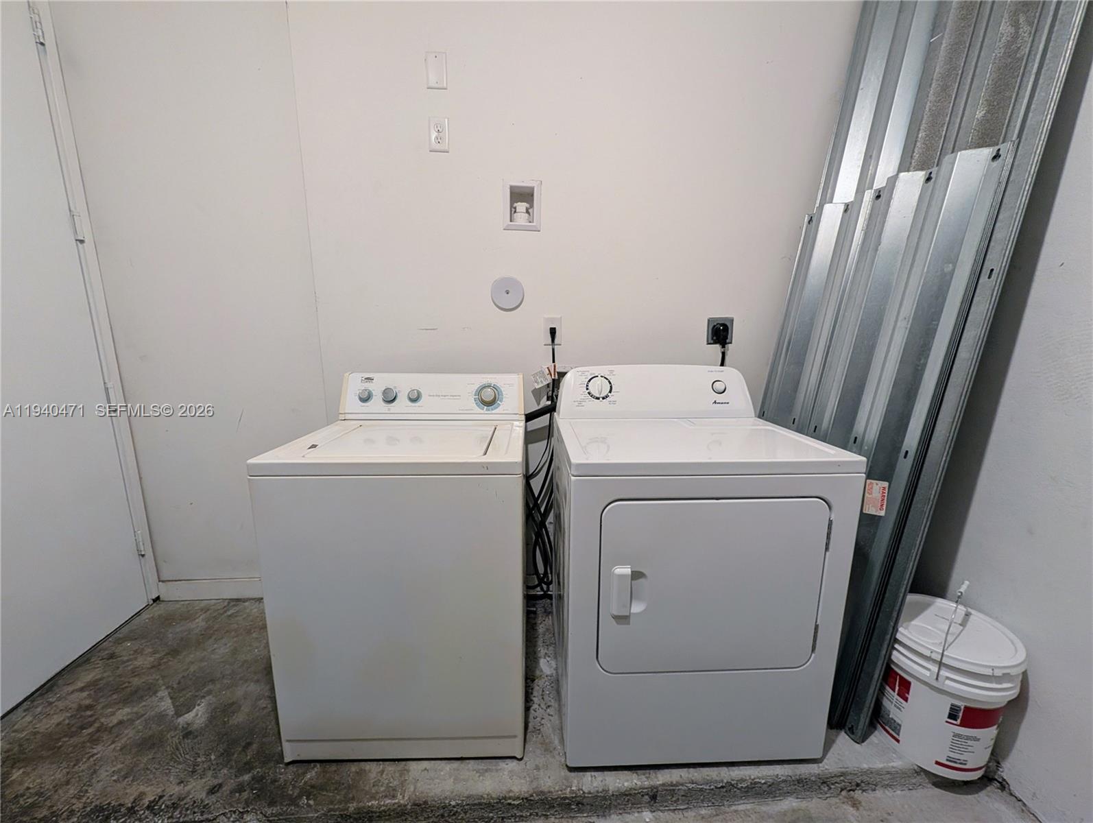 3484 Northwest 13th Street, Unit 3484 Lauderhill, FL 33311 - Photo 38 of 49 a utility room with dryer and washer