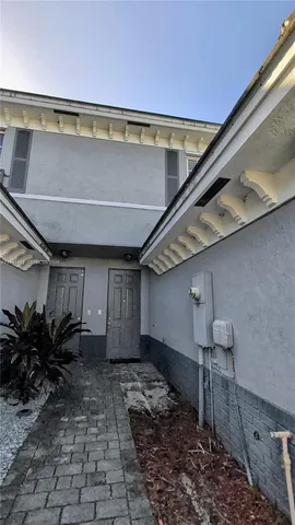a view of a house with a patio