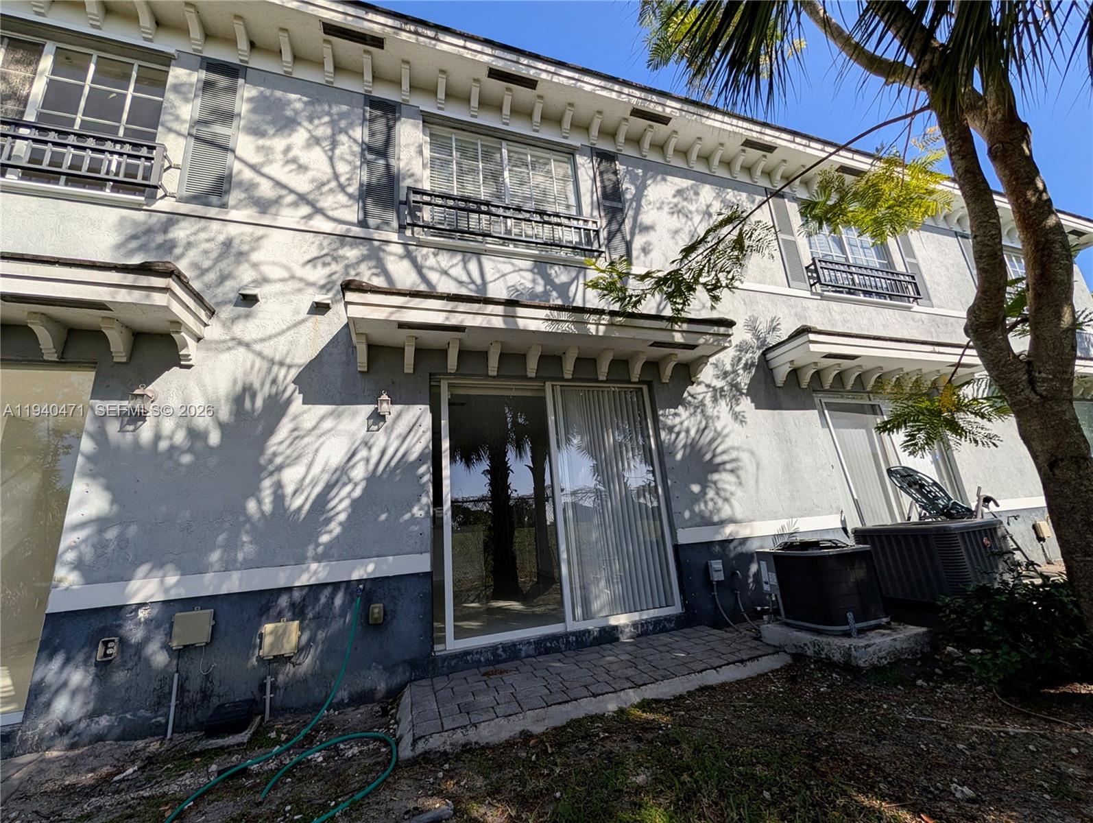 3484 Northwest 13th Street, Unit 3484 Lauderhill, FL 33311 - Photo 40 of 49 a view of a house with a patio