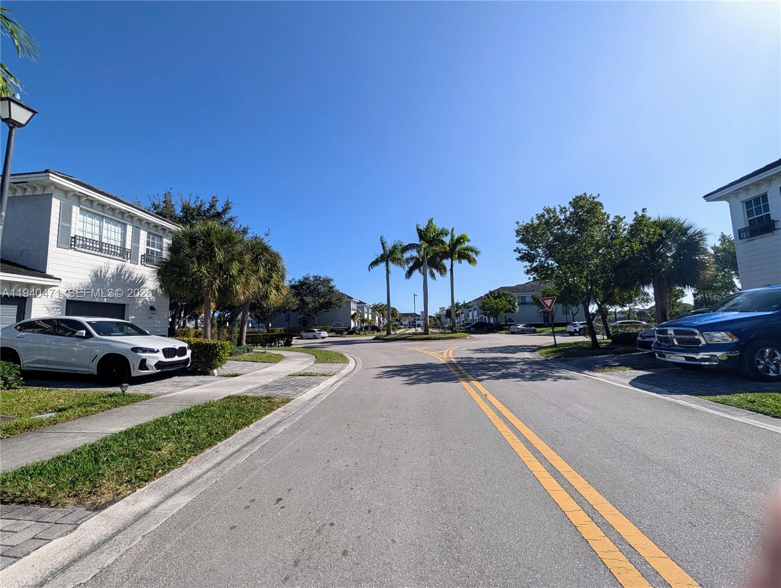 3484 Northwest 13th Street, Unit 3484 Lauderhill, FL 33311 - Photo 45 of 49 a view of a house with swimming pool and sitting area