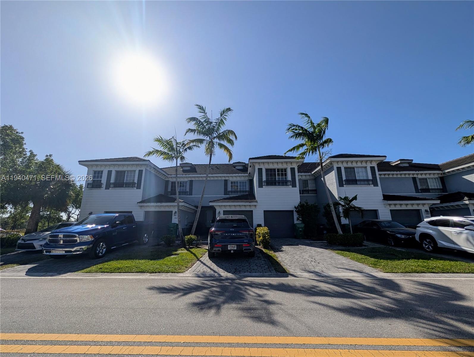 3484 Northwest 13th Street, Unit 3484 Lauderhill, FL 33311 - Photo 47 of 49 a front view of a house with a yard