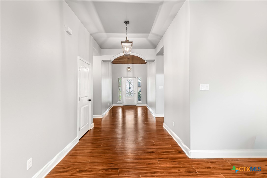 204 James Street Inez, TX 77968 - Photo 4 of 35 a view of a livingroom with wooden floor