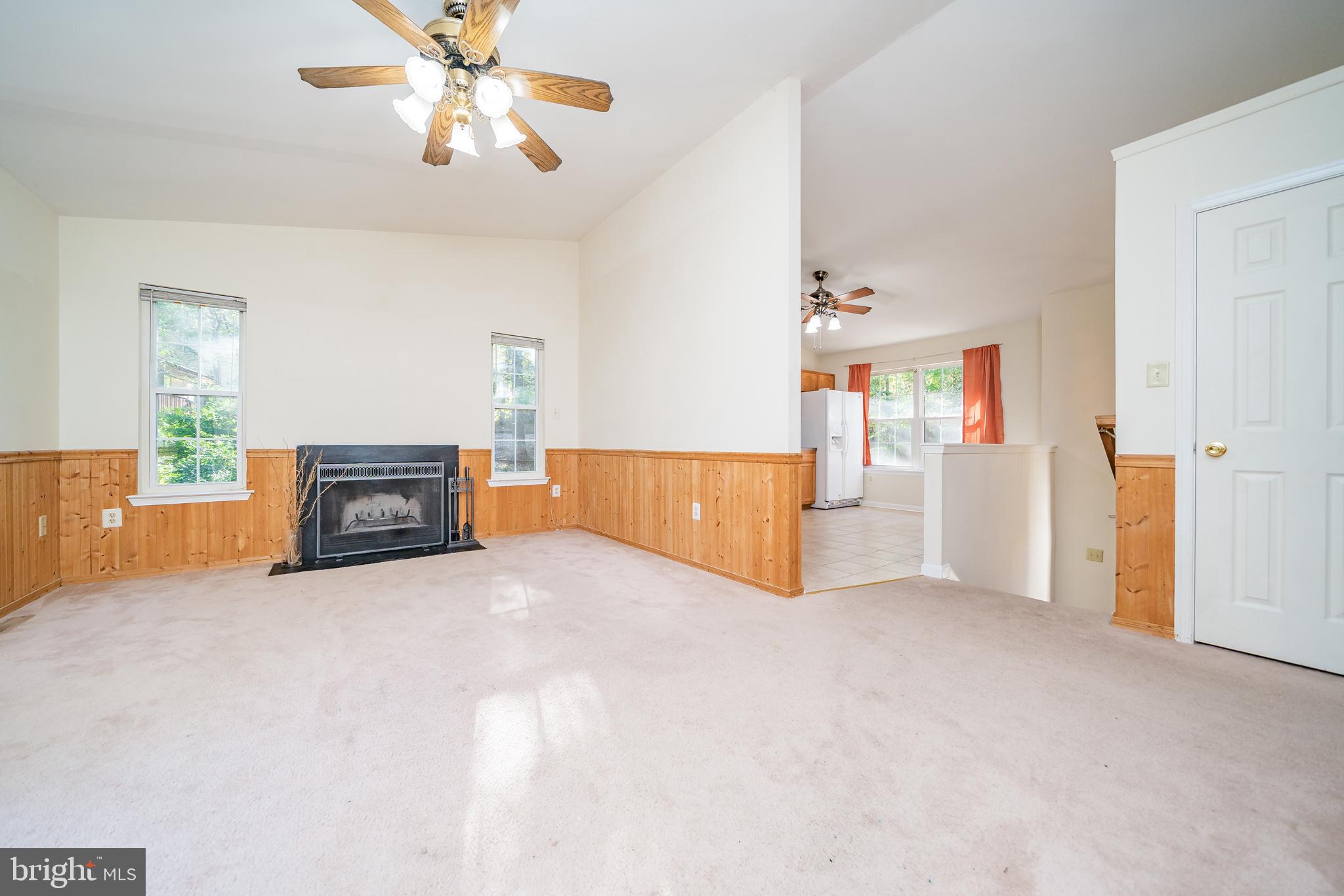 11109 Rawhide Road Lusby, MD 20657 - Photo 9 of 41 Ceiling fan in living room and kitch