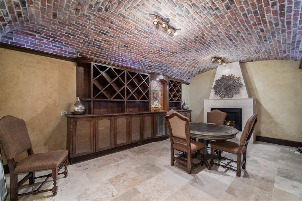 2315 Routh Street Dallas, TX 75201 - Photo 16 of 38 a dining room with furniture and front door