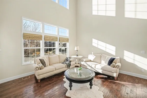 a workspace with furniture window and book shelf