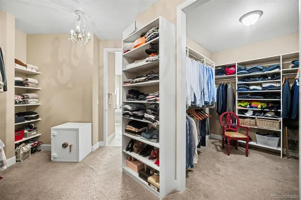 a bedroom with a bed and a table