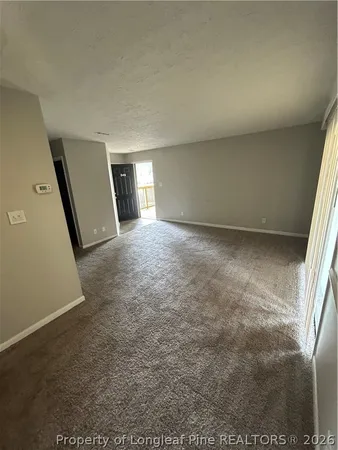 en empty room with windows