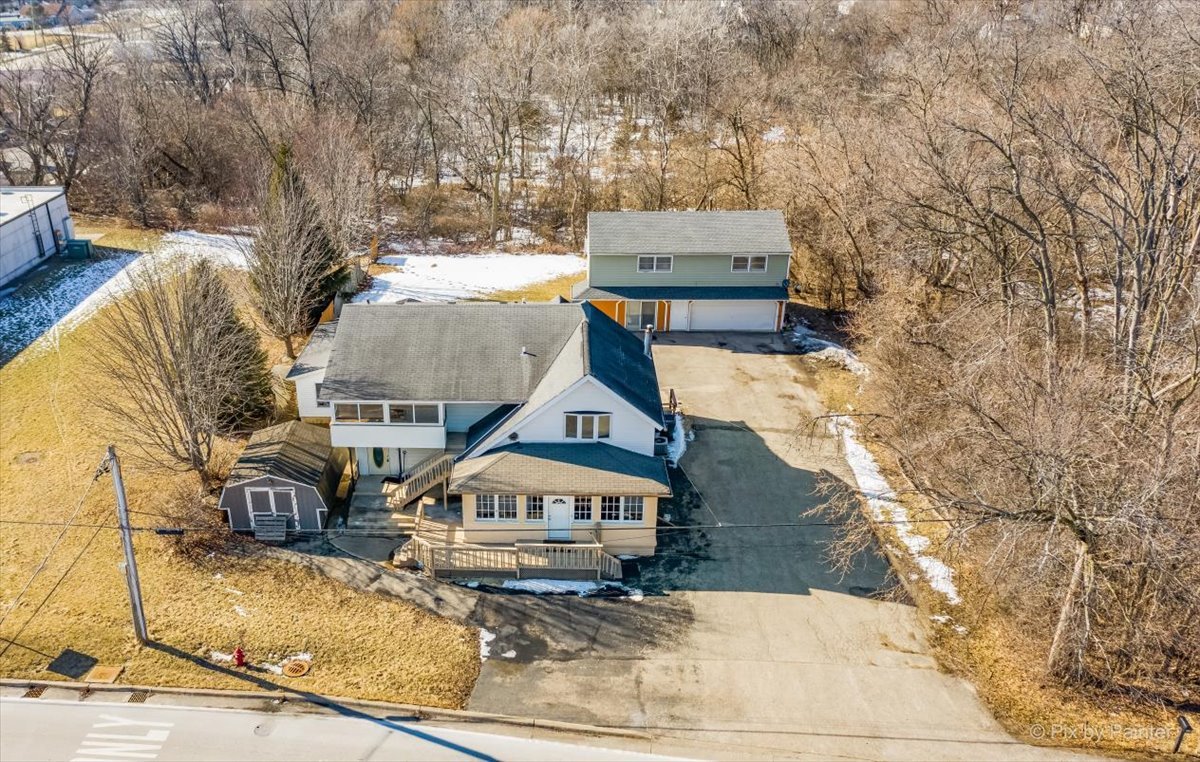 544 Hainesville Road Round Lake Park, IL 60073 - Photo 1 of 50 a view of a house with a yard