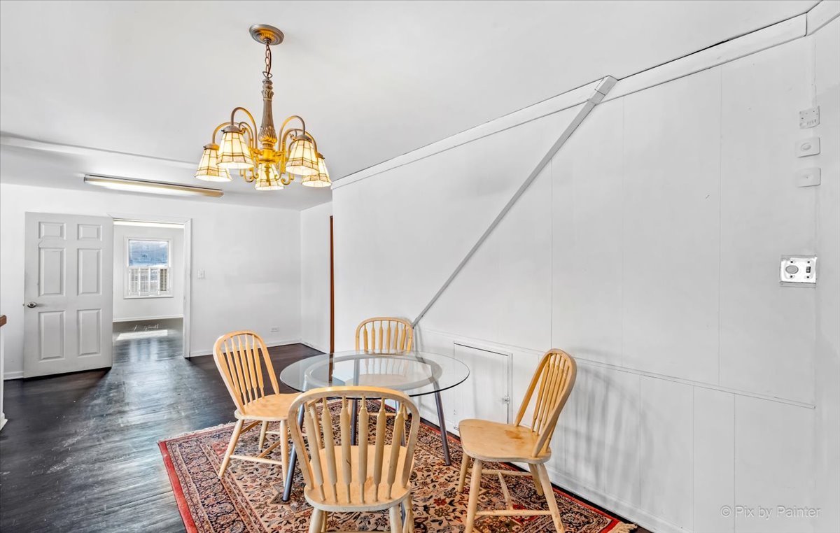 544 Hainesville Road Round Lake Park, IL 60073 - Photo 22 of 50 a view of a dining room with furniture and chandelier