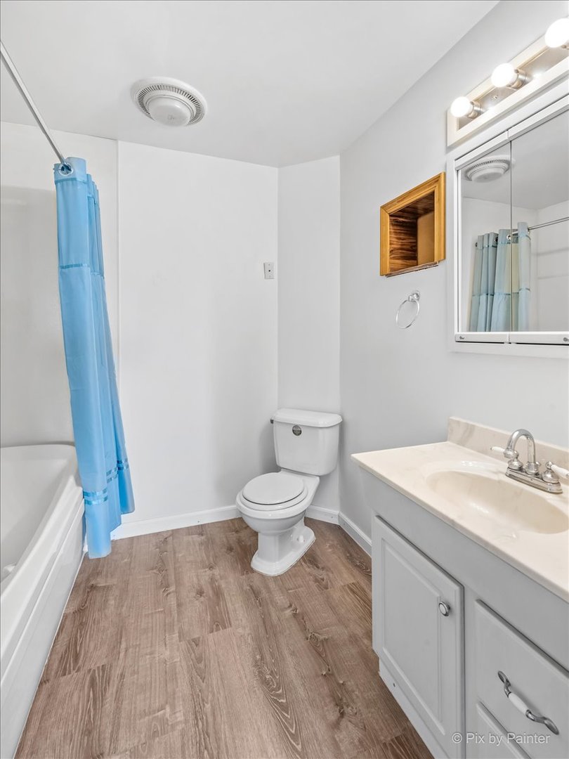 544 Hainesville Road Round Lake Park, IL 60073 - Photo 38 of 50 a bathroom with a sink a toilet and a shower