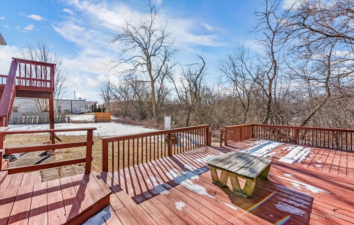 544 Hainesville Road Round Lake Park, IL 60073 - Photo 49 of 50 a view of balcony with wooden floor and outdoor seating