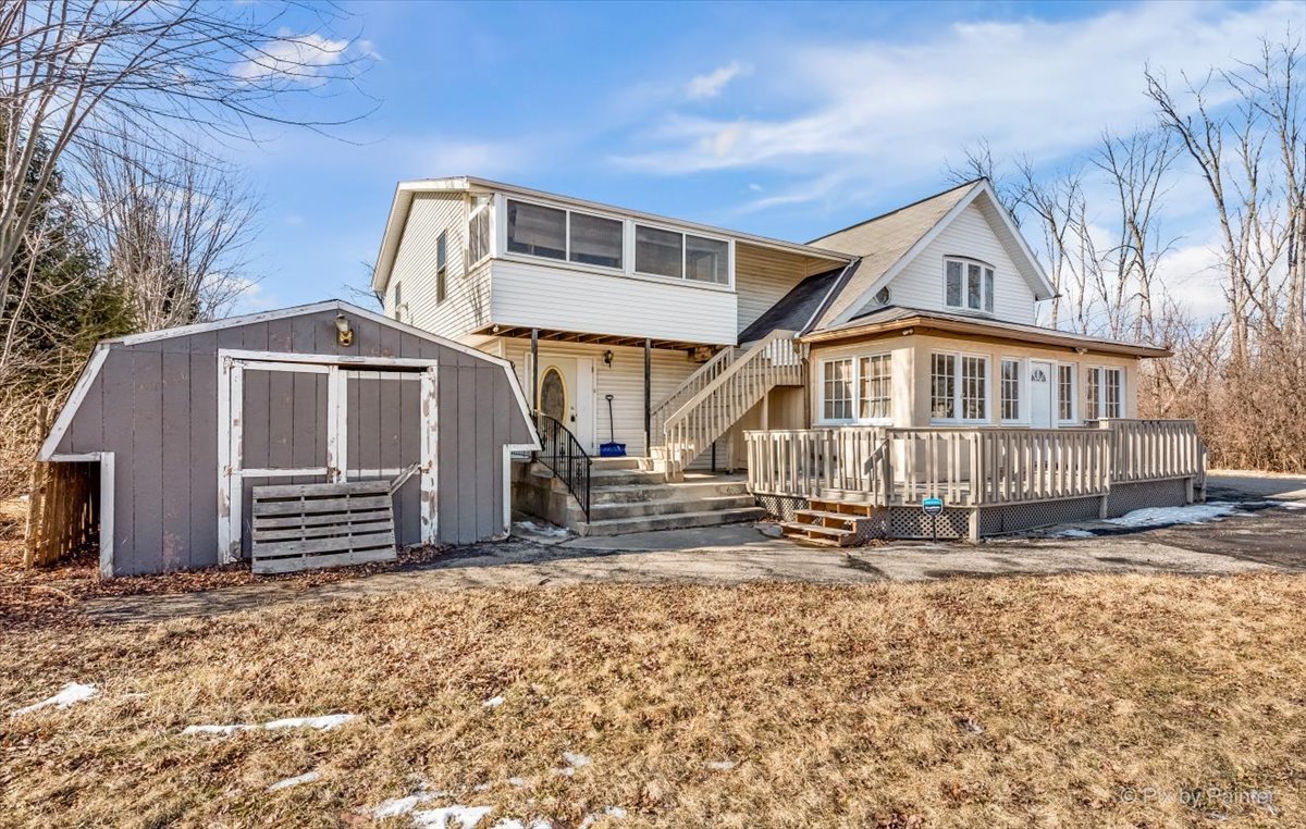 544 Hainesville Road Round Lake Park, IL 60073 - Photo 5 of 50 a front view of a house with a yard