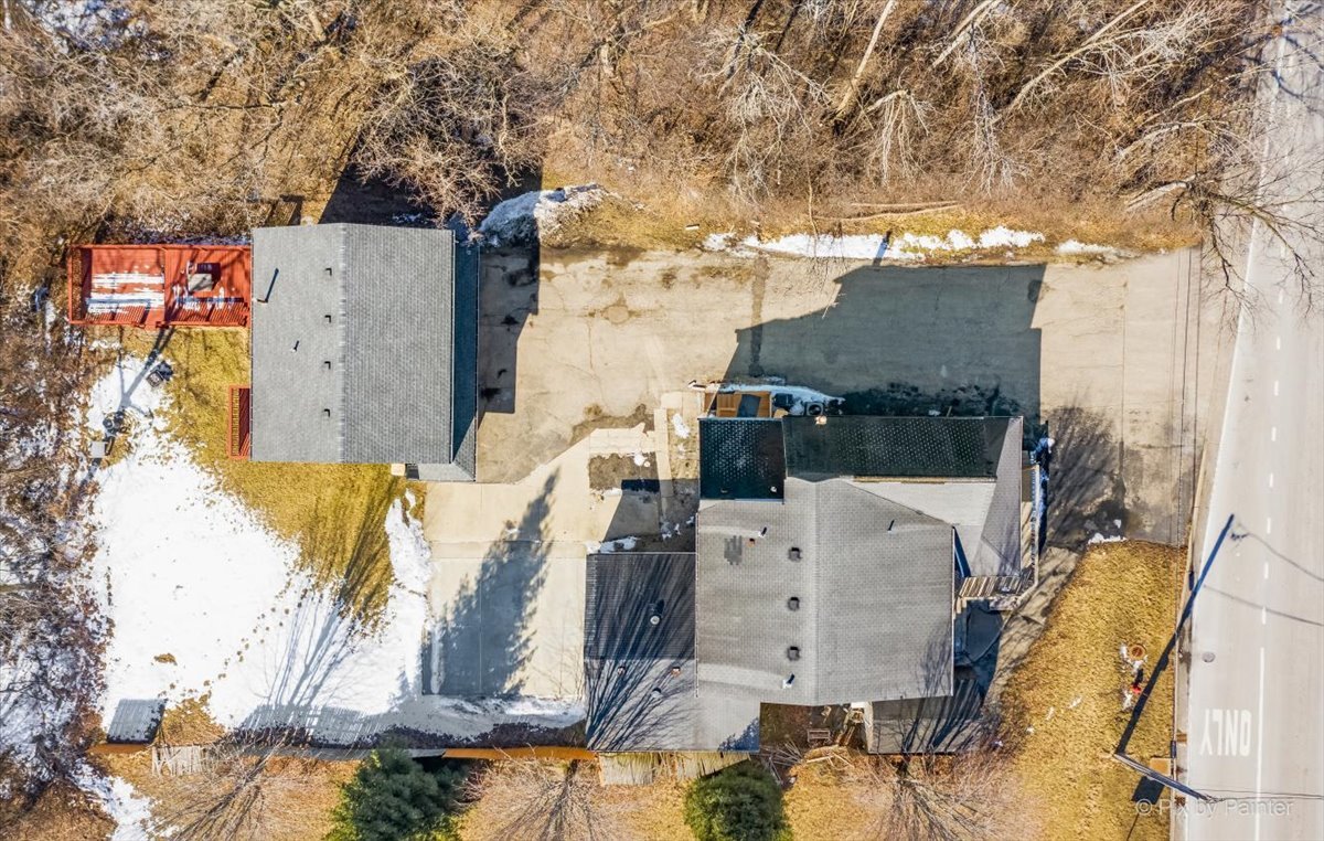 544 Hainesville Road Round Lake Park, IL 60073 - Photo 10 of 50 an aerial view of a residential apartment building with a yard