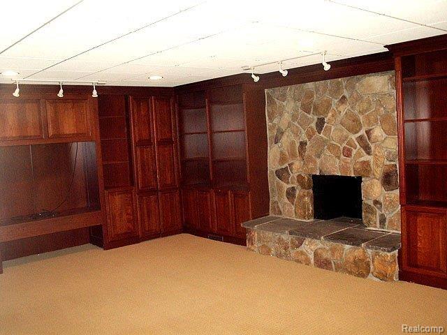 5595 Kirkridge Trail Rochester, MI 48306 - Photo 18 of 24 Lower Level Entertainment Area