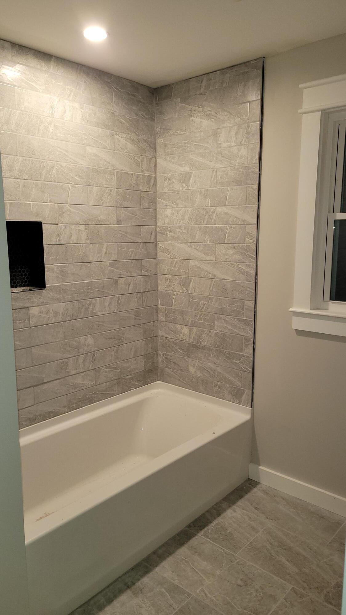 20 Seth Parker Road Centerville, MA 02632 - Photo 15 of 24 a bathroom with a bathtub and a shower