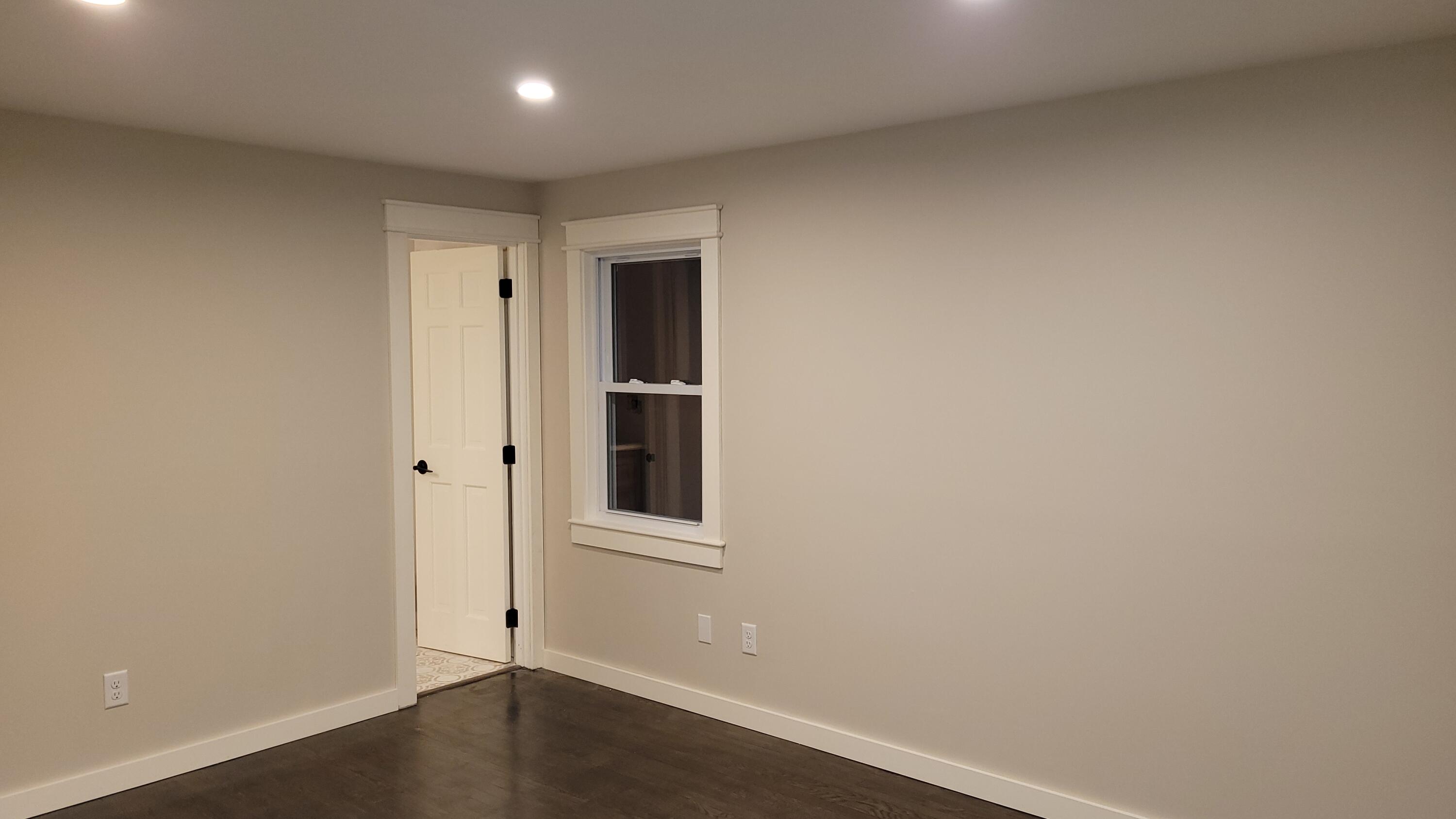 20 Seth Parker Road Centerville, MA 02632 - Photo 18 of 24 an empty room with wooden floor and windows