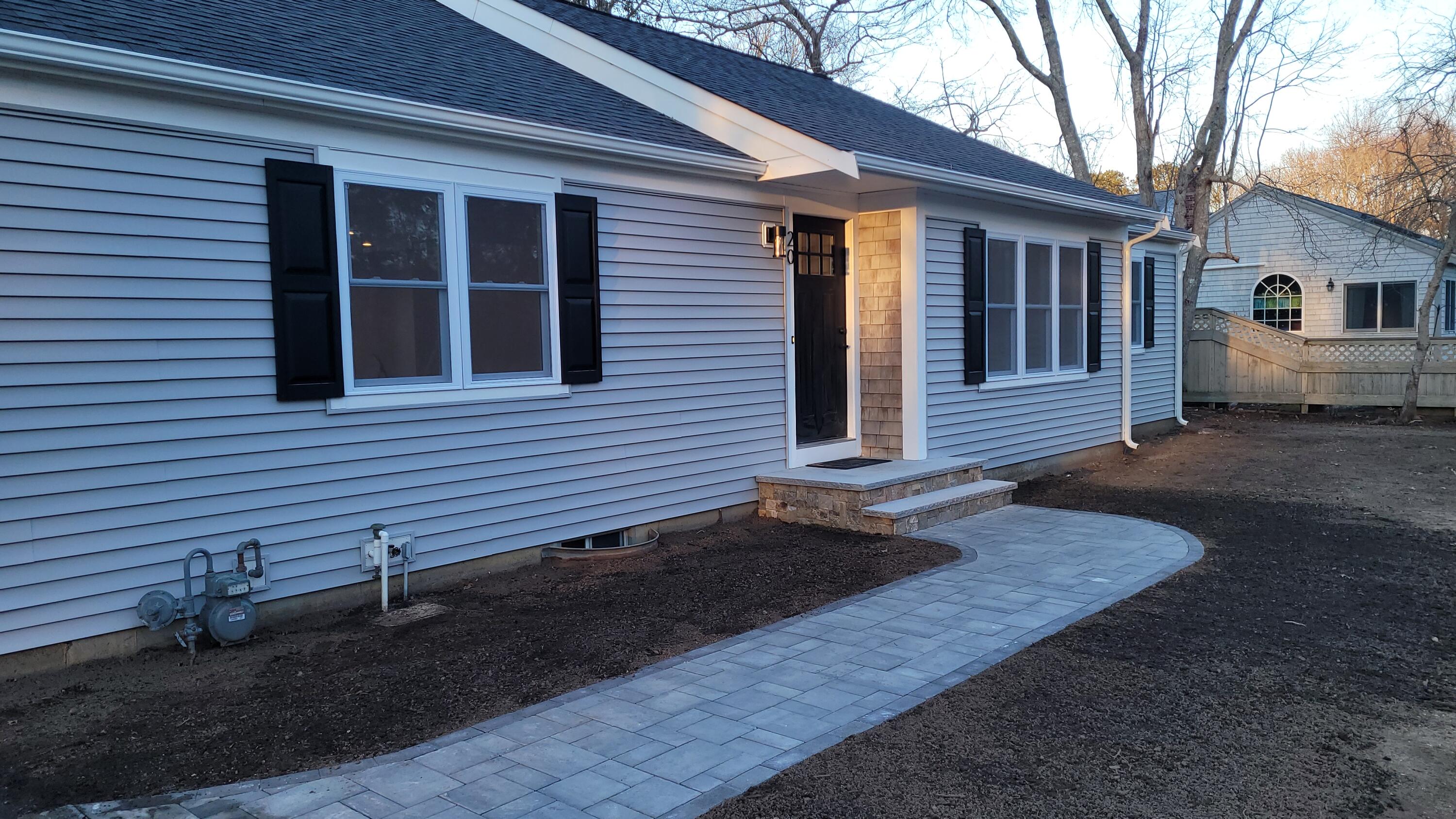 20 Seth Parker Road Centerville, MA 02632 - Photo 3 of 24 a front view of a house with a yard
