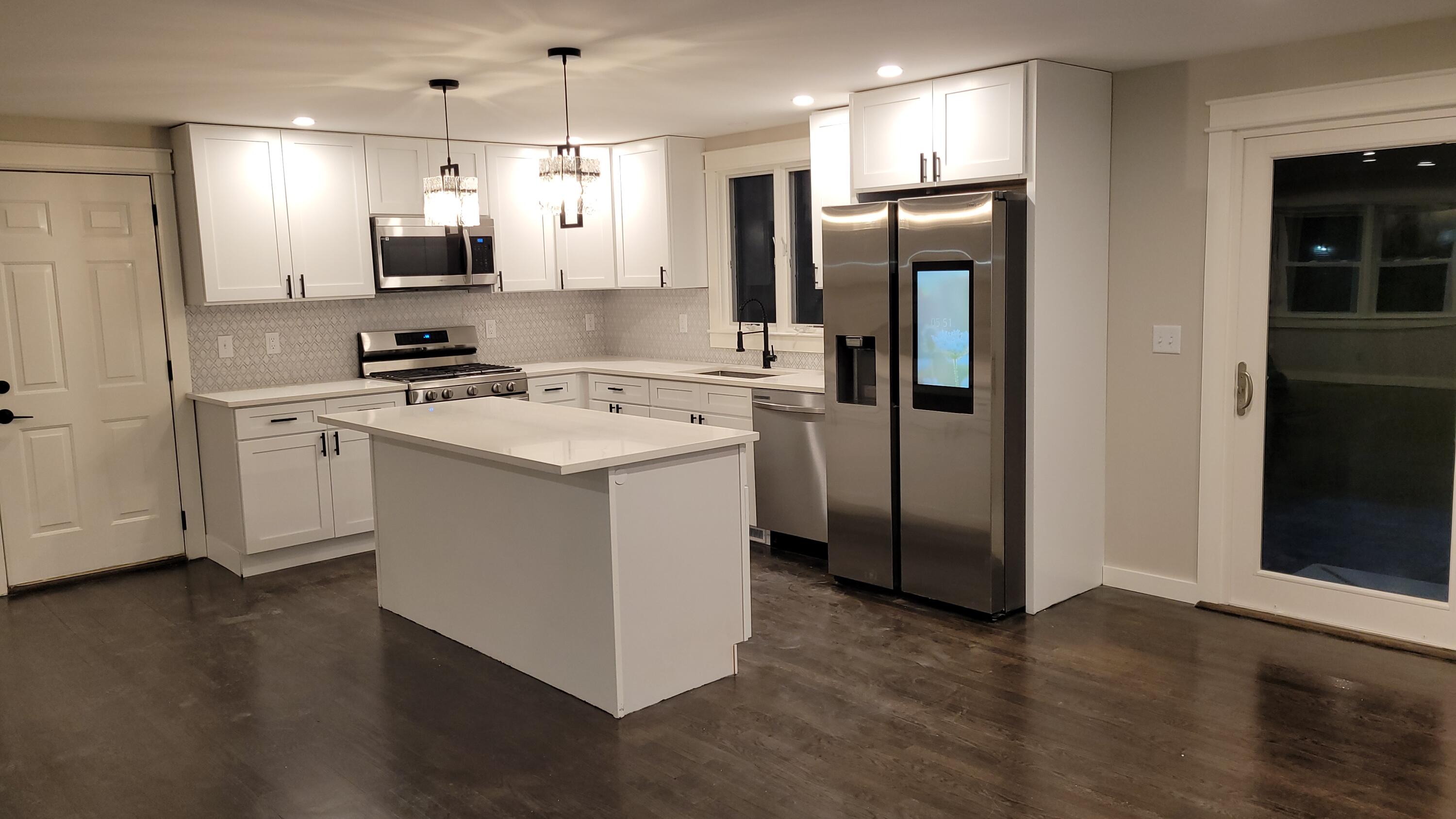 20 Seth Parker Road Centerville, MA 02632 - Photo 4 of 24 a kitchen with a refrigerator stove and sink