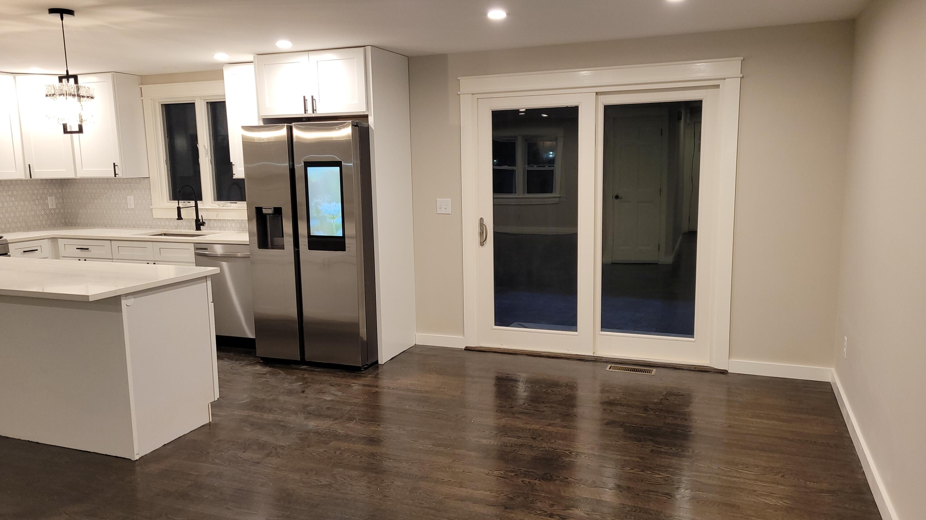 20 Seth Parker Road Centerville, MA 02632 - Photo 5 of 24 a kitchen with stainless steel appliances kitchen island granite countertop a refrigerator a sink a stove and oven with wooden floor