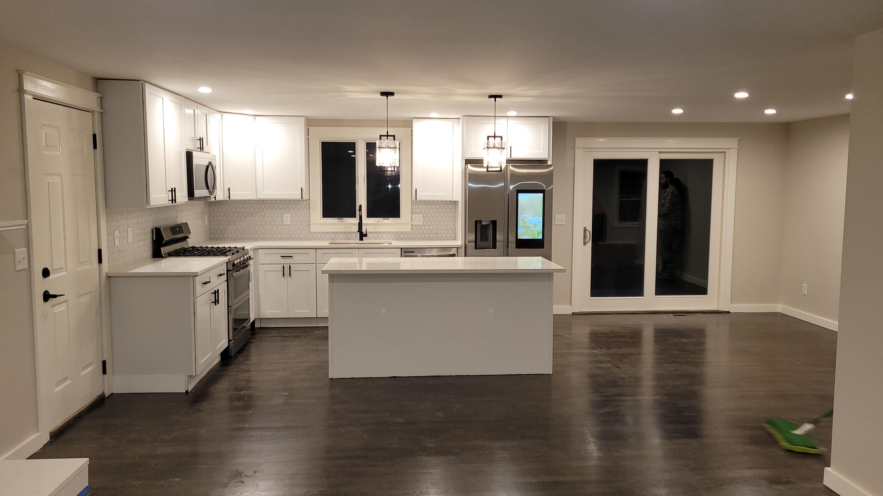 20 Seth Parker Road Centerville, MA 02632 - Photo 7 of 24 a large kitchen with stainless steel appliances granite countertop a white cabinets a sink a stove a refrigerator and island