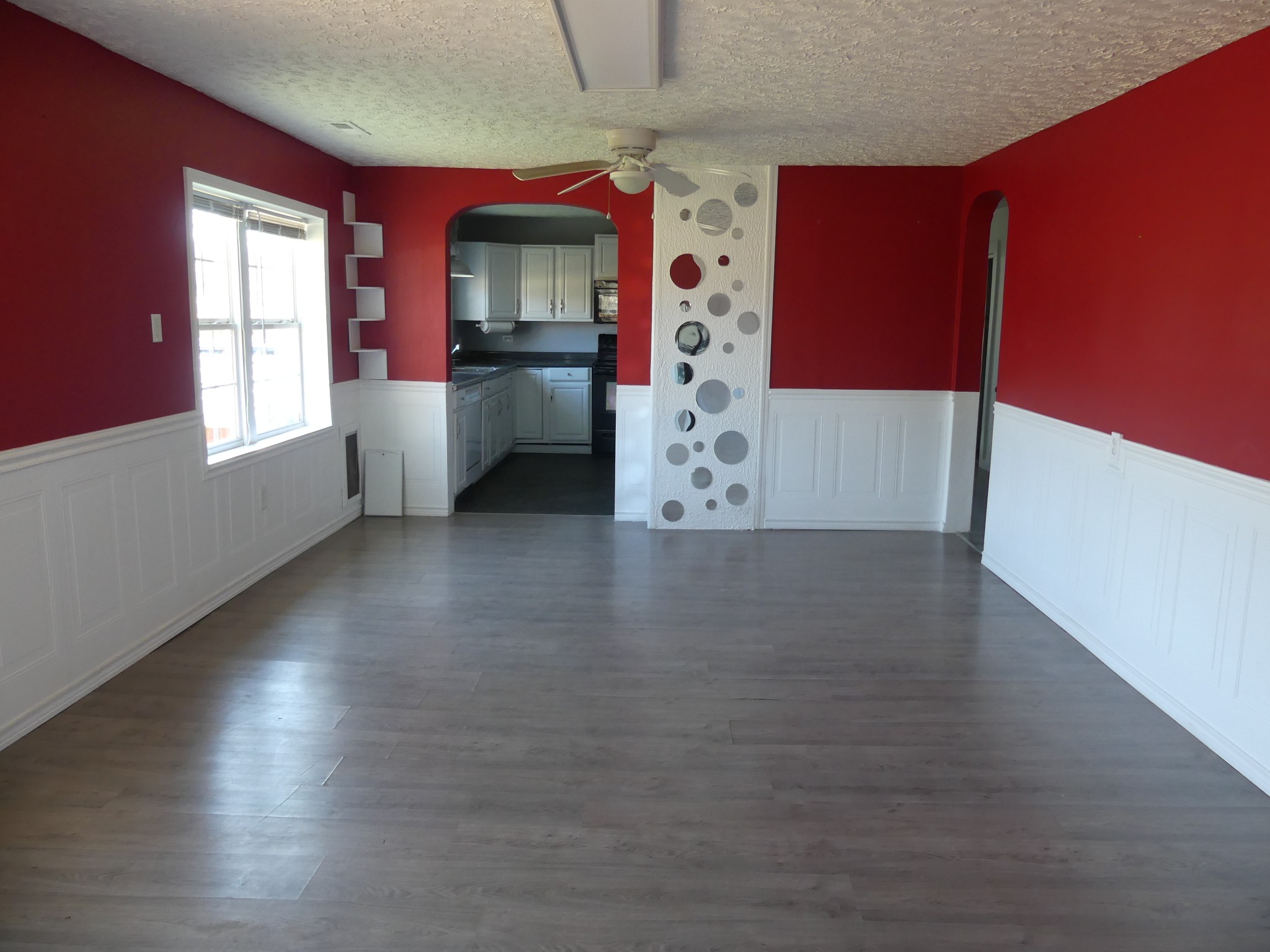 231 Mountain Road Elora, TN 37328 - Photo 10 of 32 a view of a kitchen with wooden floor and a window