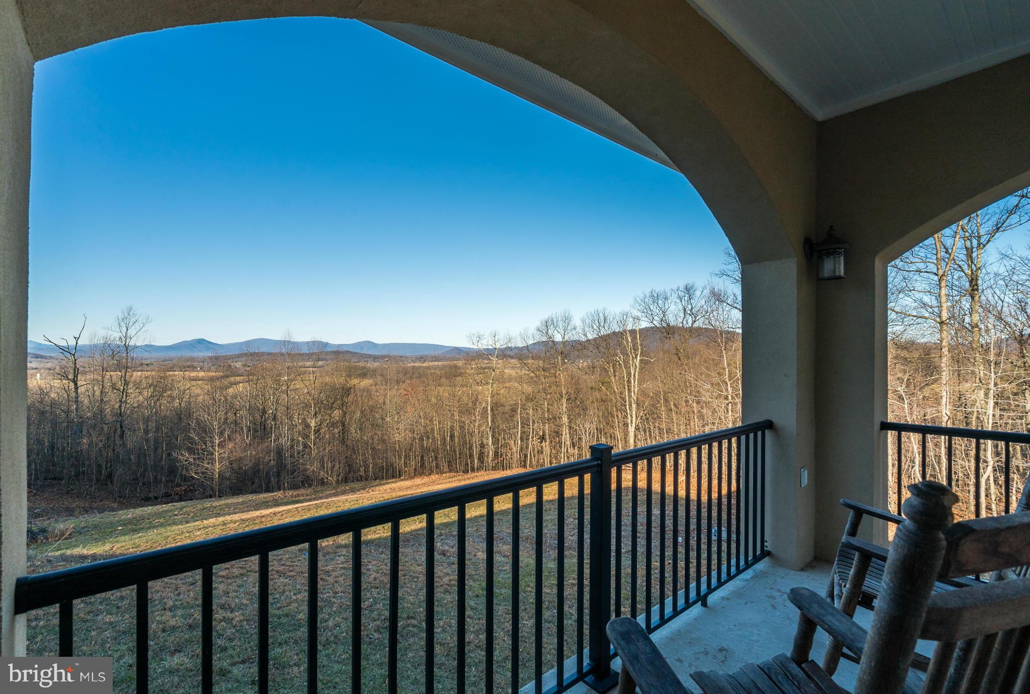 9637 Ada Road Marshall, VA 20115 - Photo 35 of 52 Main Level exterior porch with fireplace