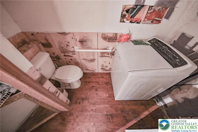 a bed room with a bed and a table