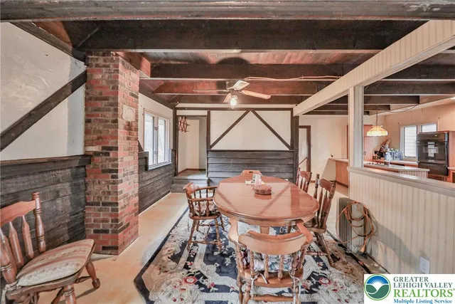a view of a livingroom with wooden floor