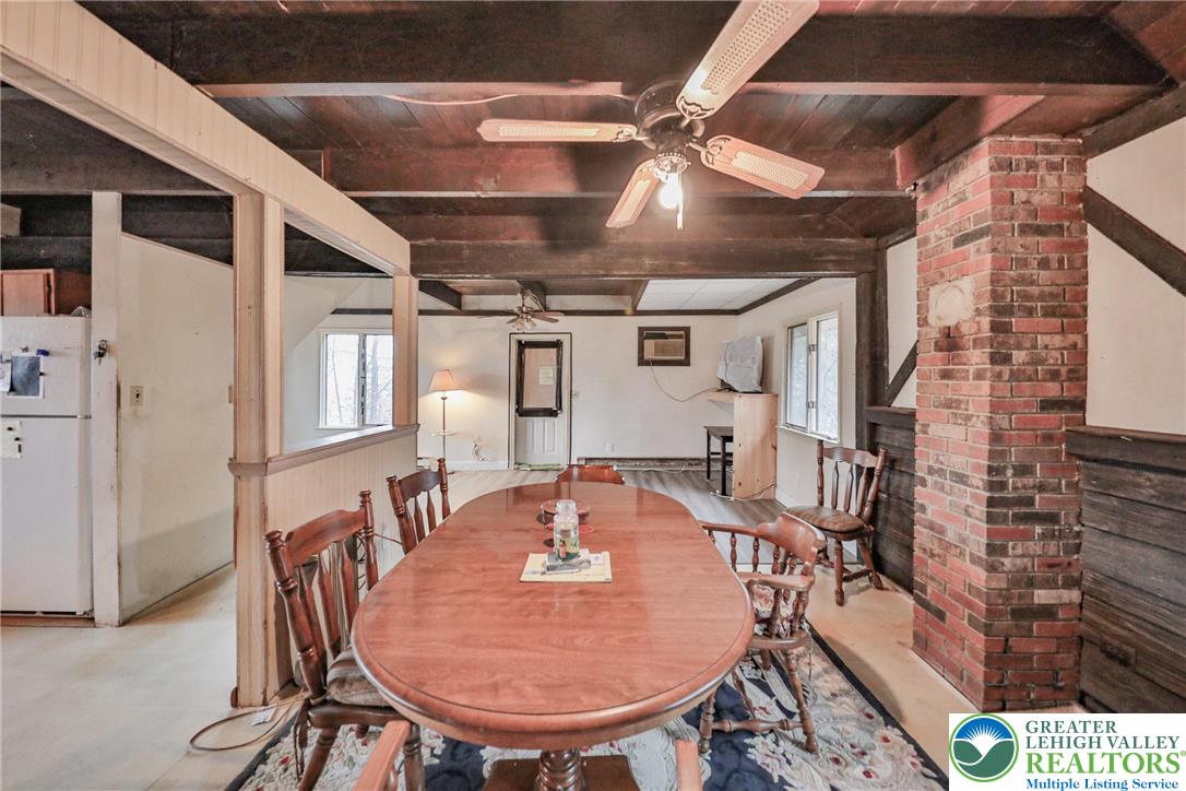 355 Hickory Road Palmerton, PA 18071 - Photo 24 of 66 a dining room with furniture and a chandelier