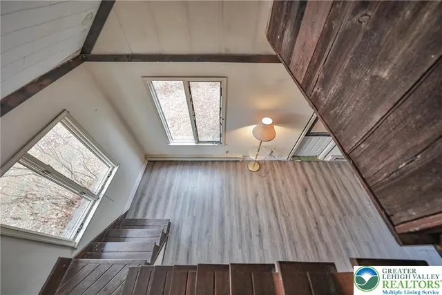 a view of a livingroom with a staircase