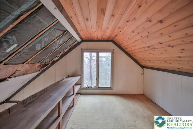 a view of a hardwood and hallway