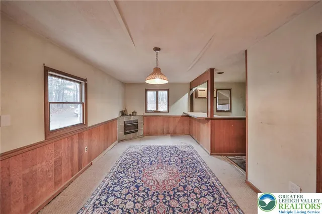 a view of a hallway with a large window