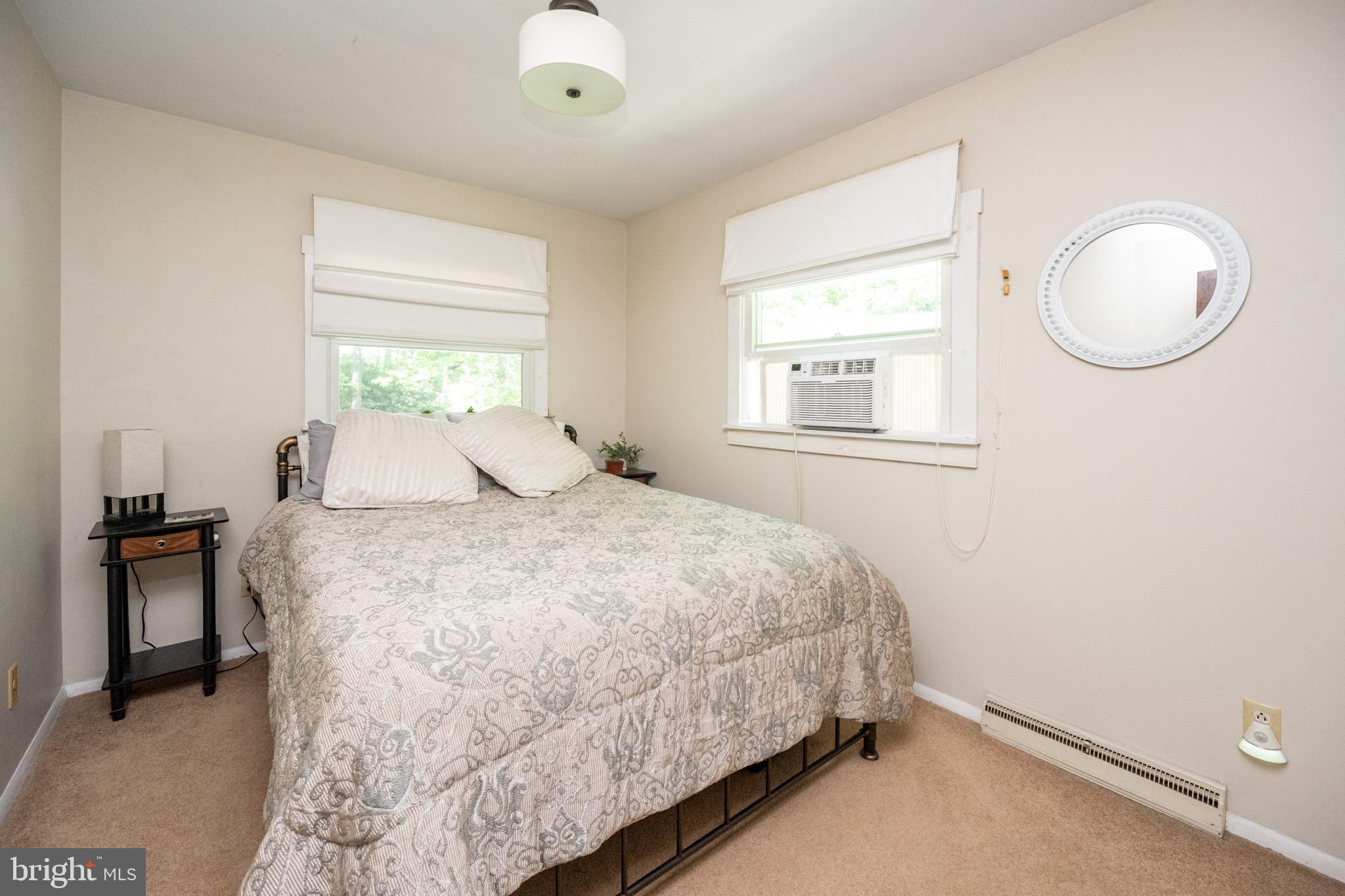 346 Skippers Point Road Oakland, MD 21550 - Photo 26 of 73 a bedroom with a bed and a window