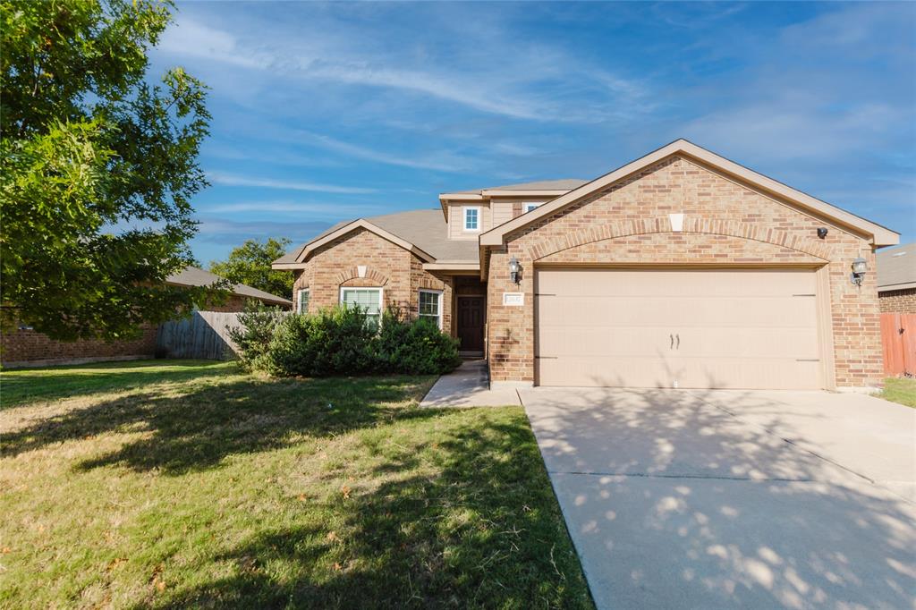 12637 Forest Lawn Road Rhome, TX 76078 - Photo 2 of 31 a view of a house with a yard
