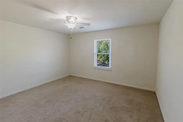 a bathroom with a double vanity sink and mirror