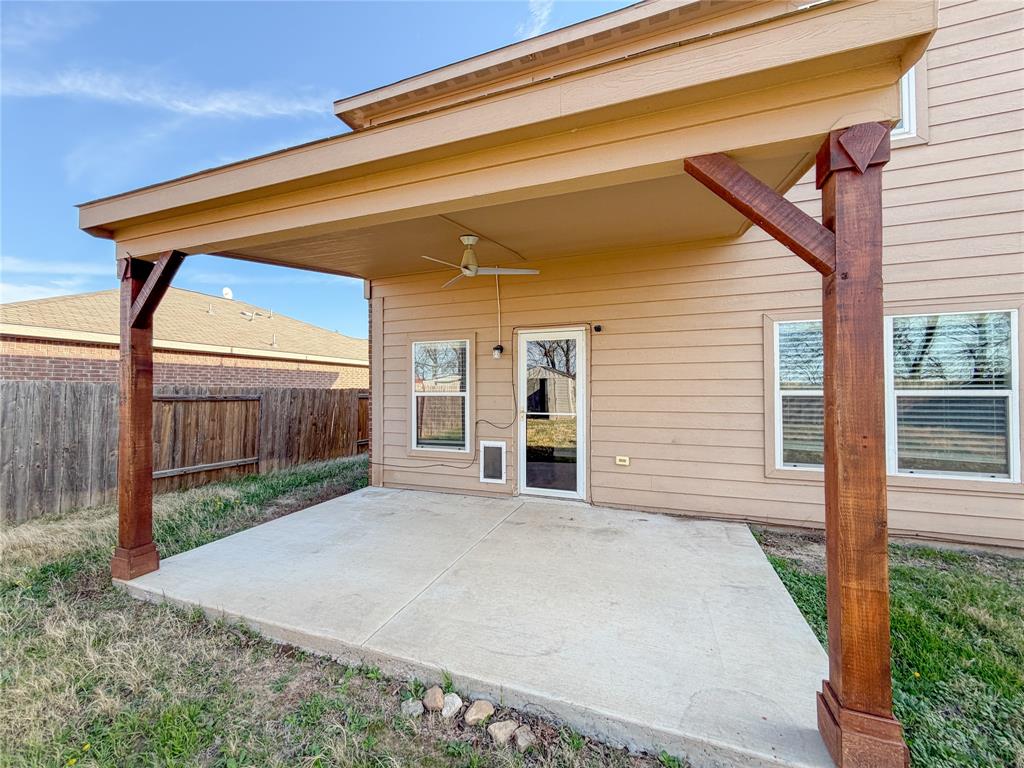 12637 Forest Lawn Road Rhome, TX 76078 - Photo 27 of 31 a view of a house with a backyard