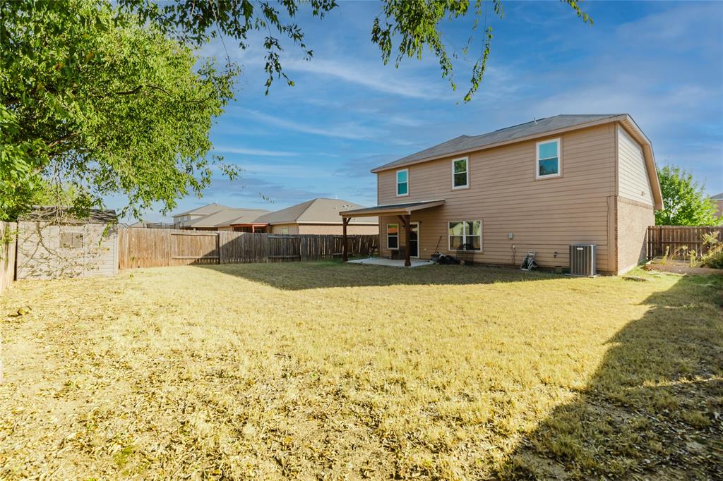 12637 Forest Lawn Road Rhome, TX 76078 - Photo 28 of 31 a view of a house with a yard