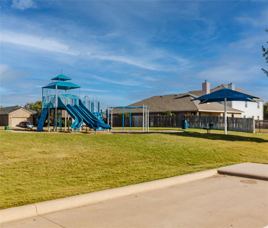 12637 Forest Lawn Road Rhome, TX 76078 - Photo 30 of 31 a front view of a house with swimming pool