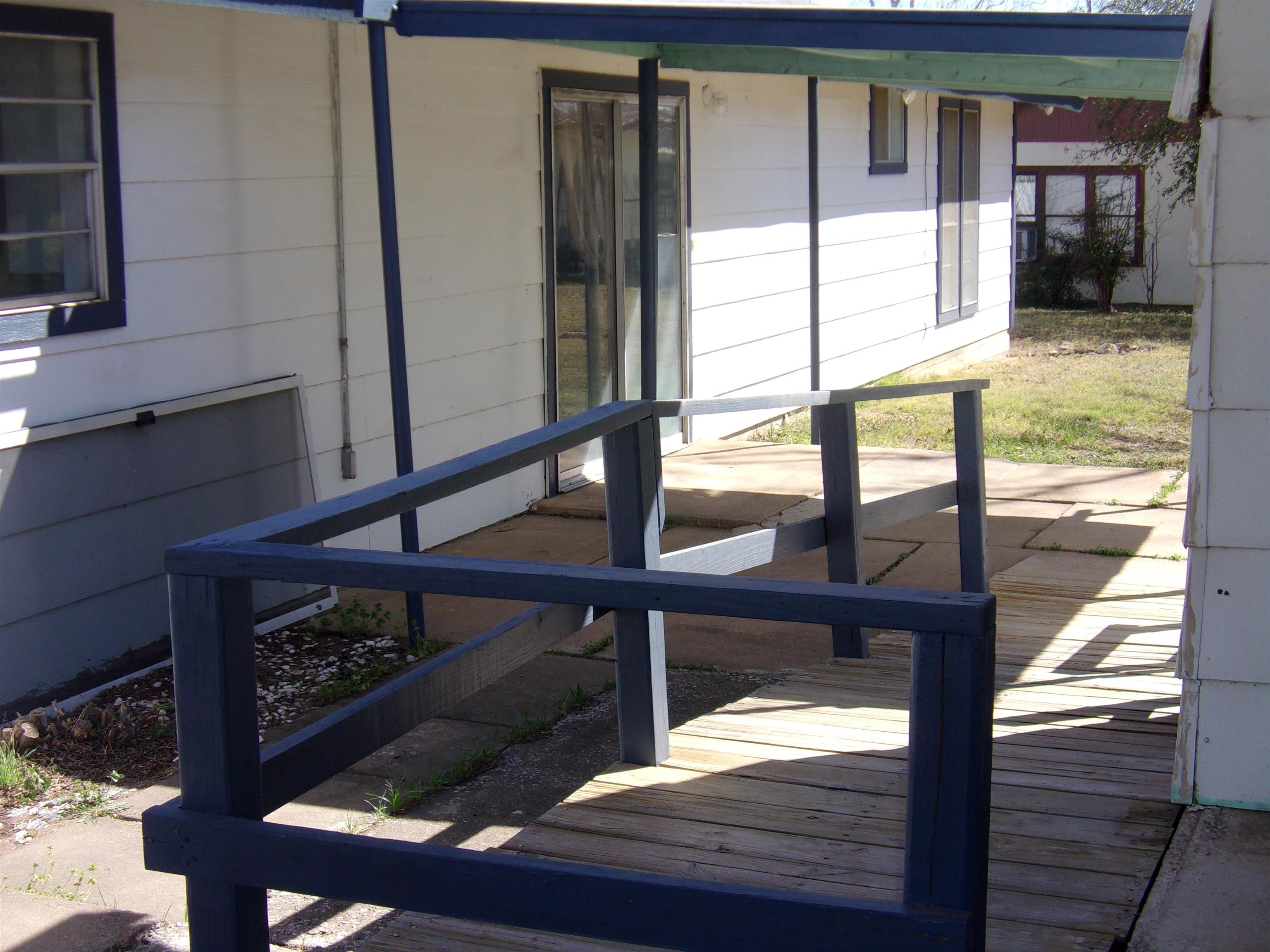 900 East Wallace Street Llano, TX 78643 - Photo 12 of 16 a view of balcony with furniture