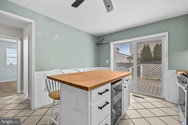 a room that has a bed and a dresser in it