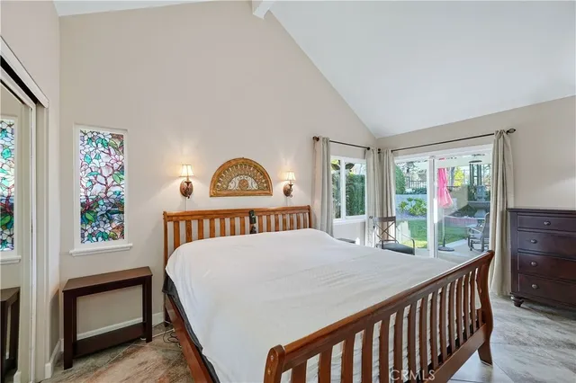 a view of a bedroom with furniture and staircase