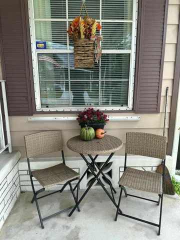 a kitchen with lots of counter top space and dining table