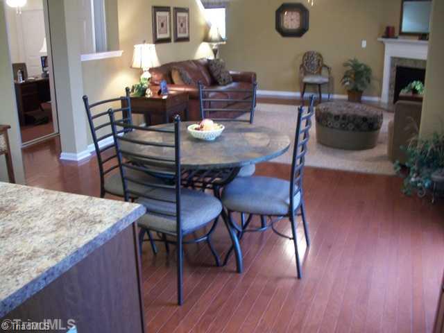 1342 Sharp Ridge Road Greensboro, NC 27406 - Photo 3 of 9 Breakfast. View of breakfast nook and family room from kitchen. Image is of model home.