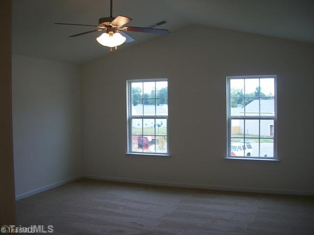 1342 Sharp Ridge Road Greensboro, NC 27406 - Photo 8 of 9 Master Bedroom. The master bedroom has a vaulted ceiling.
